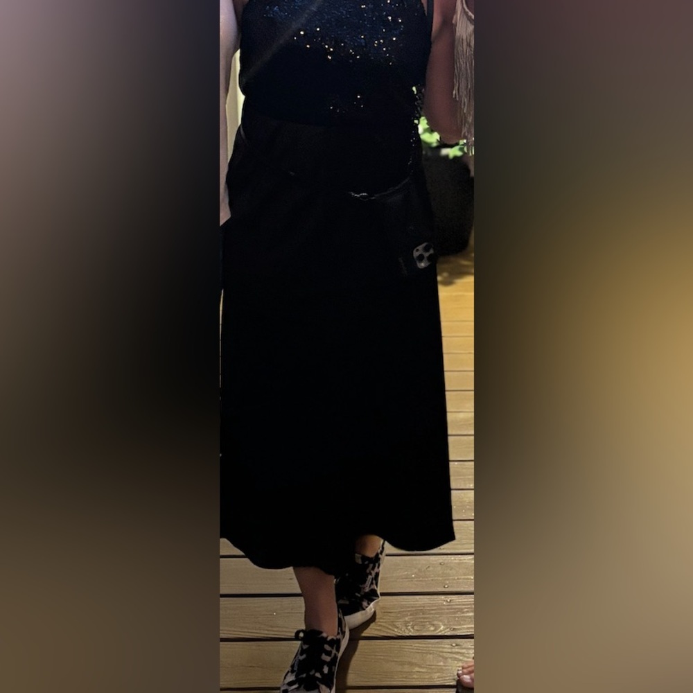 Banana Republic nwt black satin midi skirt. You can dress it up or down!